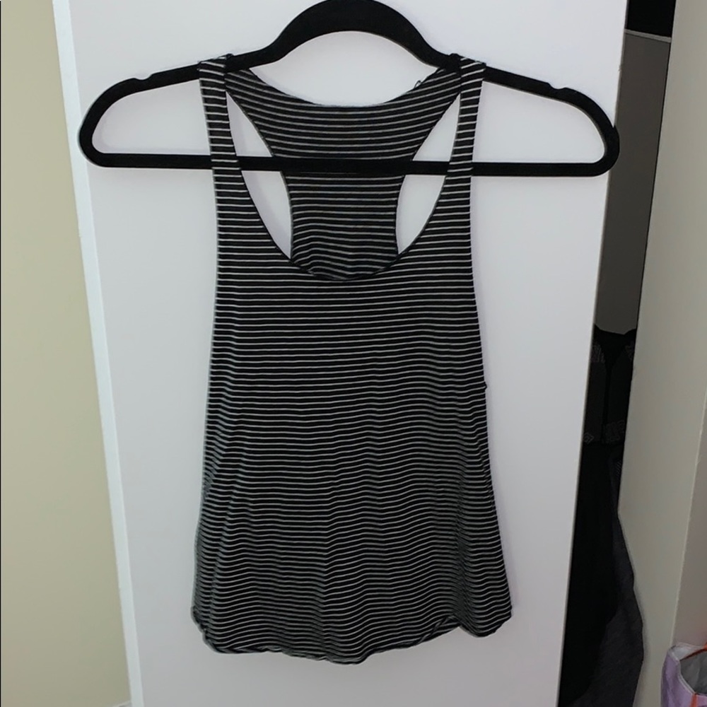 One grey and one black stripped tank tops.